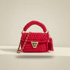 Pink crochet handbag with gold accents